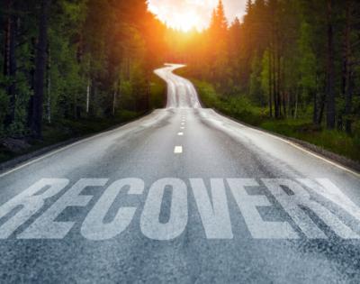 Road with the word recovery across it